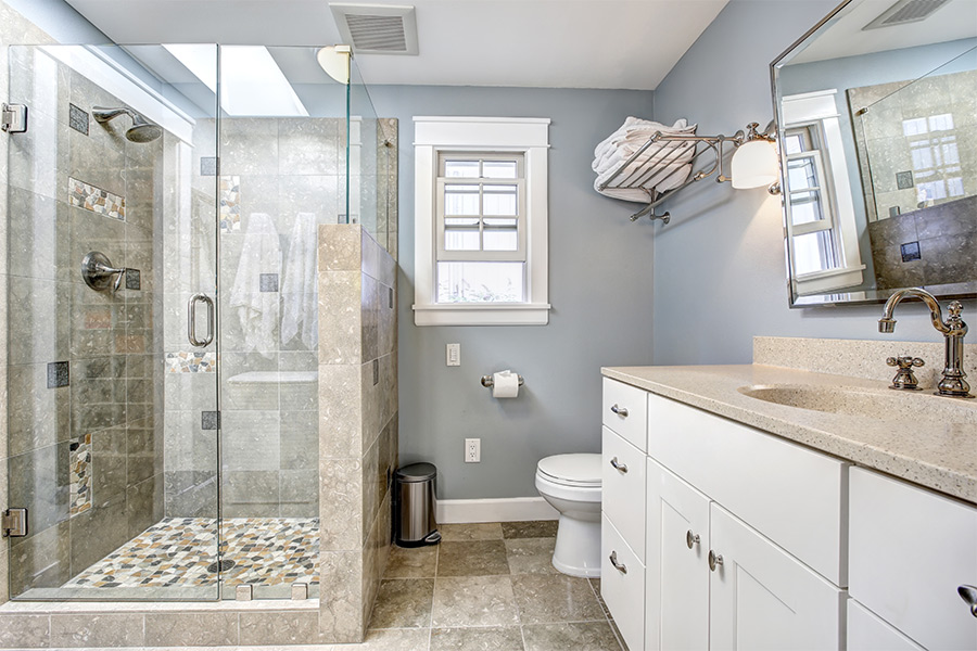 bathroom with new marble countertop installed and tile wall at shower san diego ca