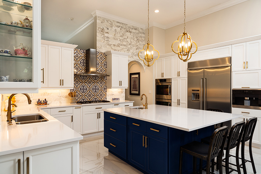 kitchen interiors remodeled with new blue vanity installed and backsplash san diego ca