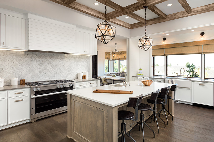 kitchen interiors with new white tile backsplah installed and wooden floors san diego ca