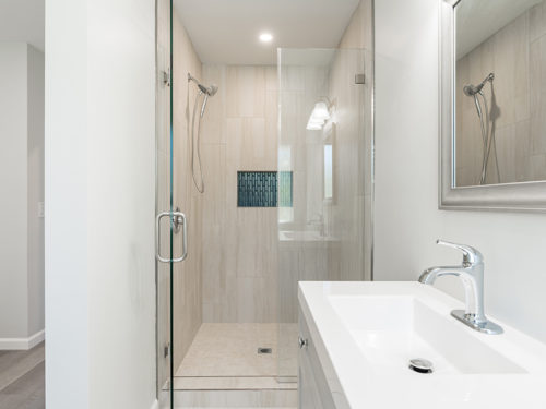 view of sink and shower on a newly remodeled bathroom san diego ca